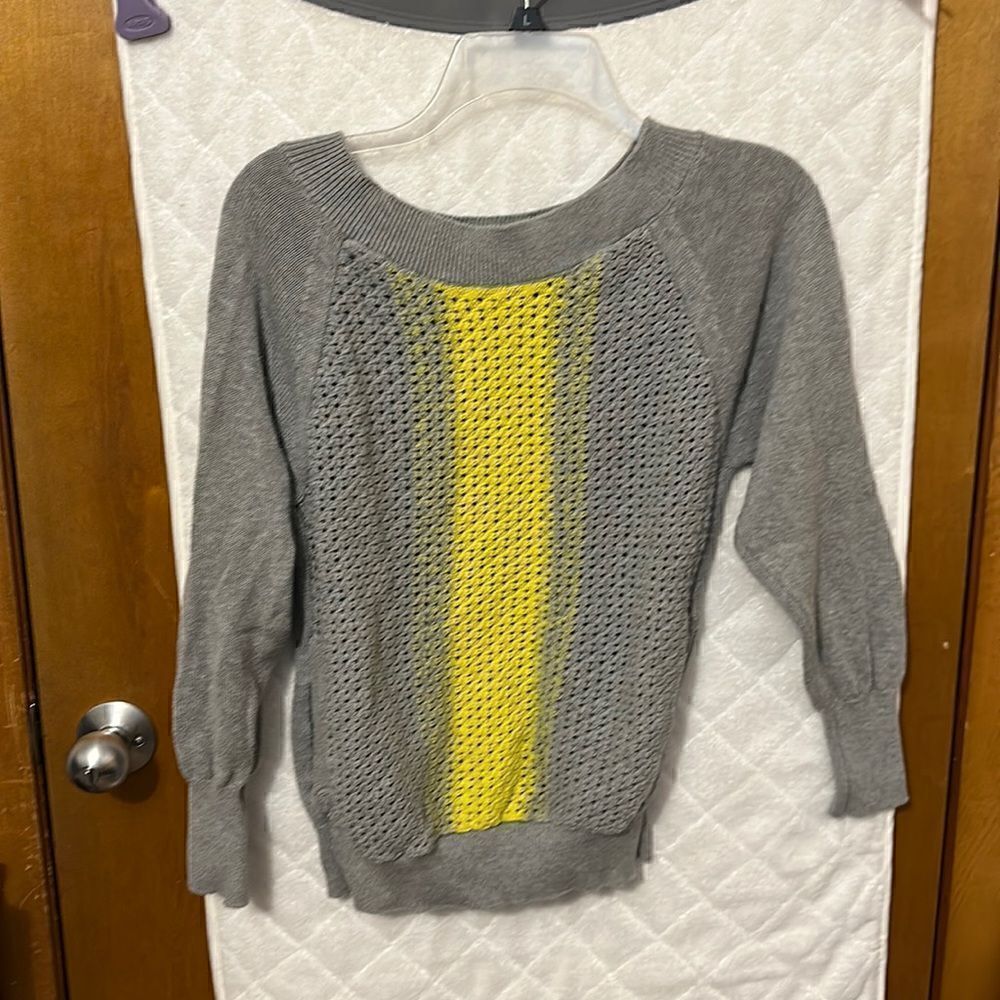 Gray and yellow sweater with pockets